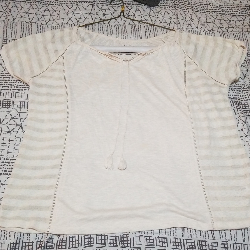 Cream colored blouse with front tassel ties
